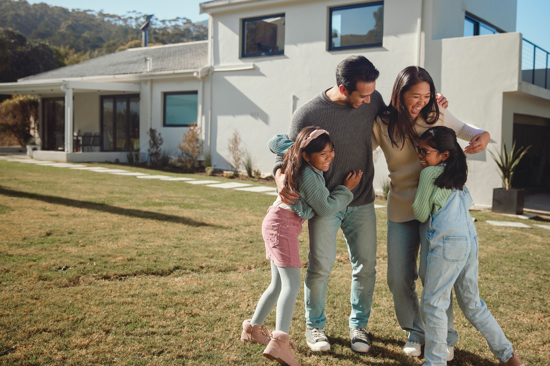 A Joyful Family of Four Embraces Love and Laughter