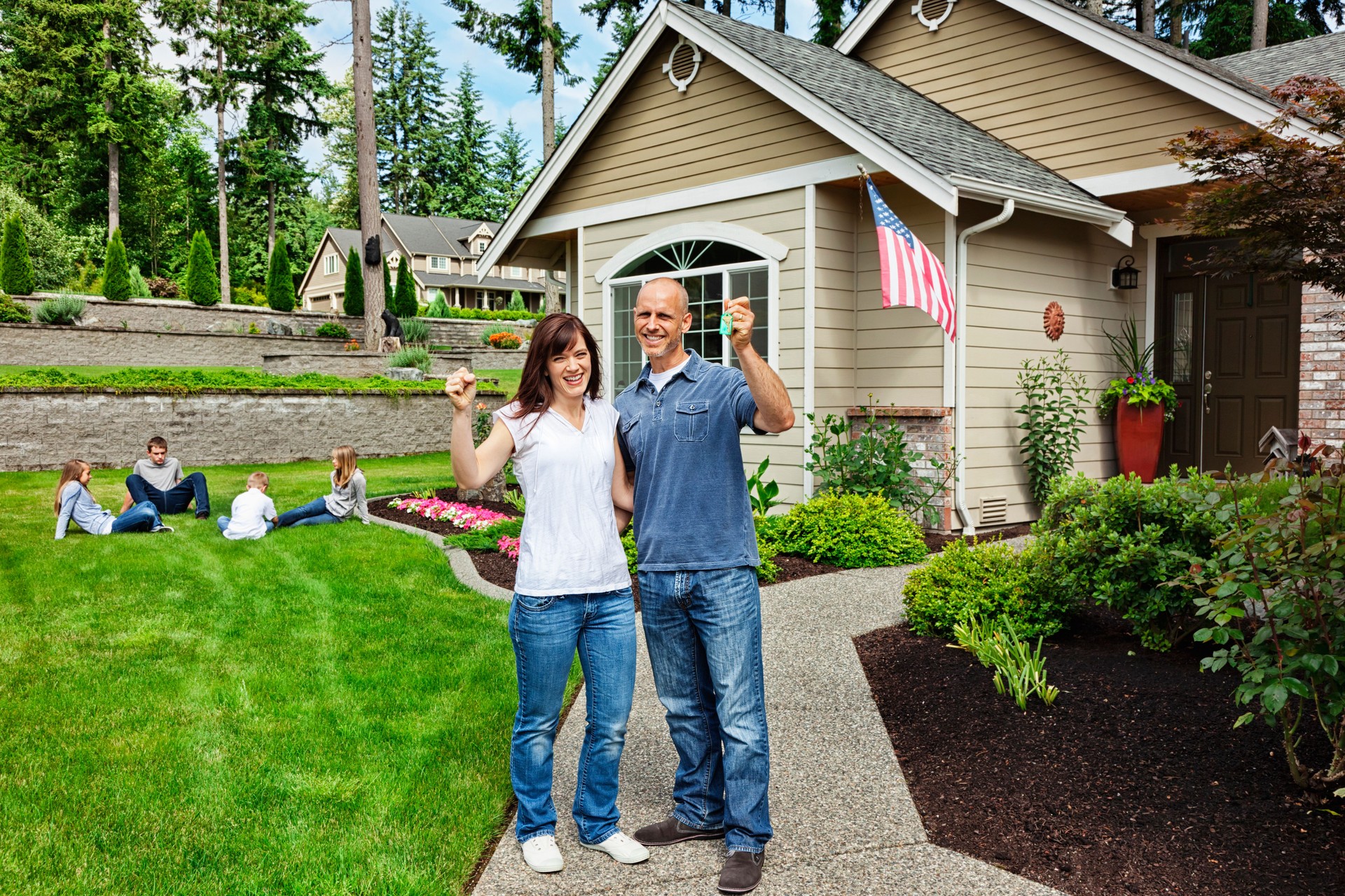 Happy Family with New Home