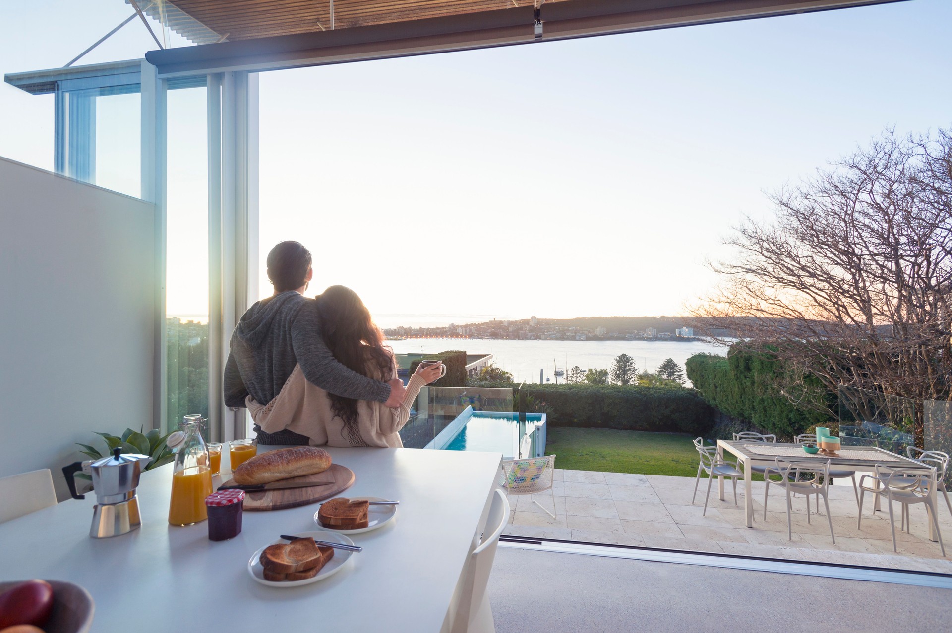 Couple having breakfast together at home.